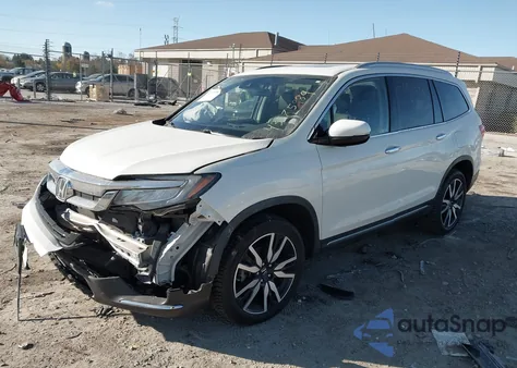 2019 Honda Pilot Touring z USA, uszkodzony, nr VIN 5FNYF6H90KB066110